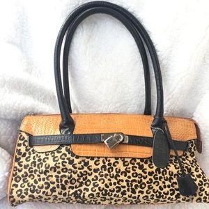 Cleo and Patek Paris leather handbag